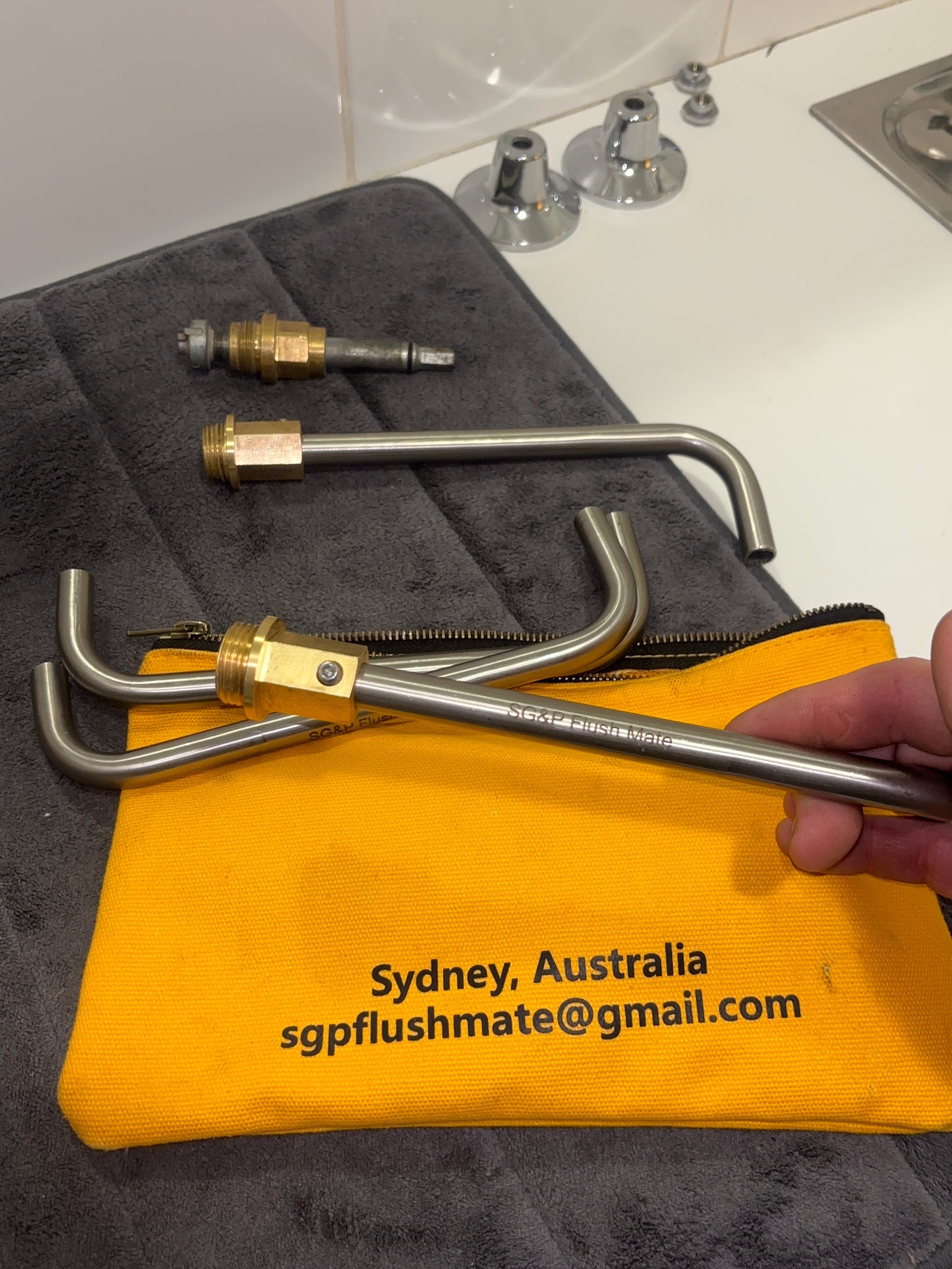 Plumbing tool. SG&P Flush Mate tool. Plumbing Tap Service Tool - with 4 brass adapters