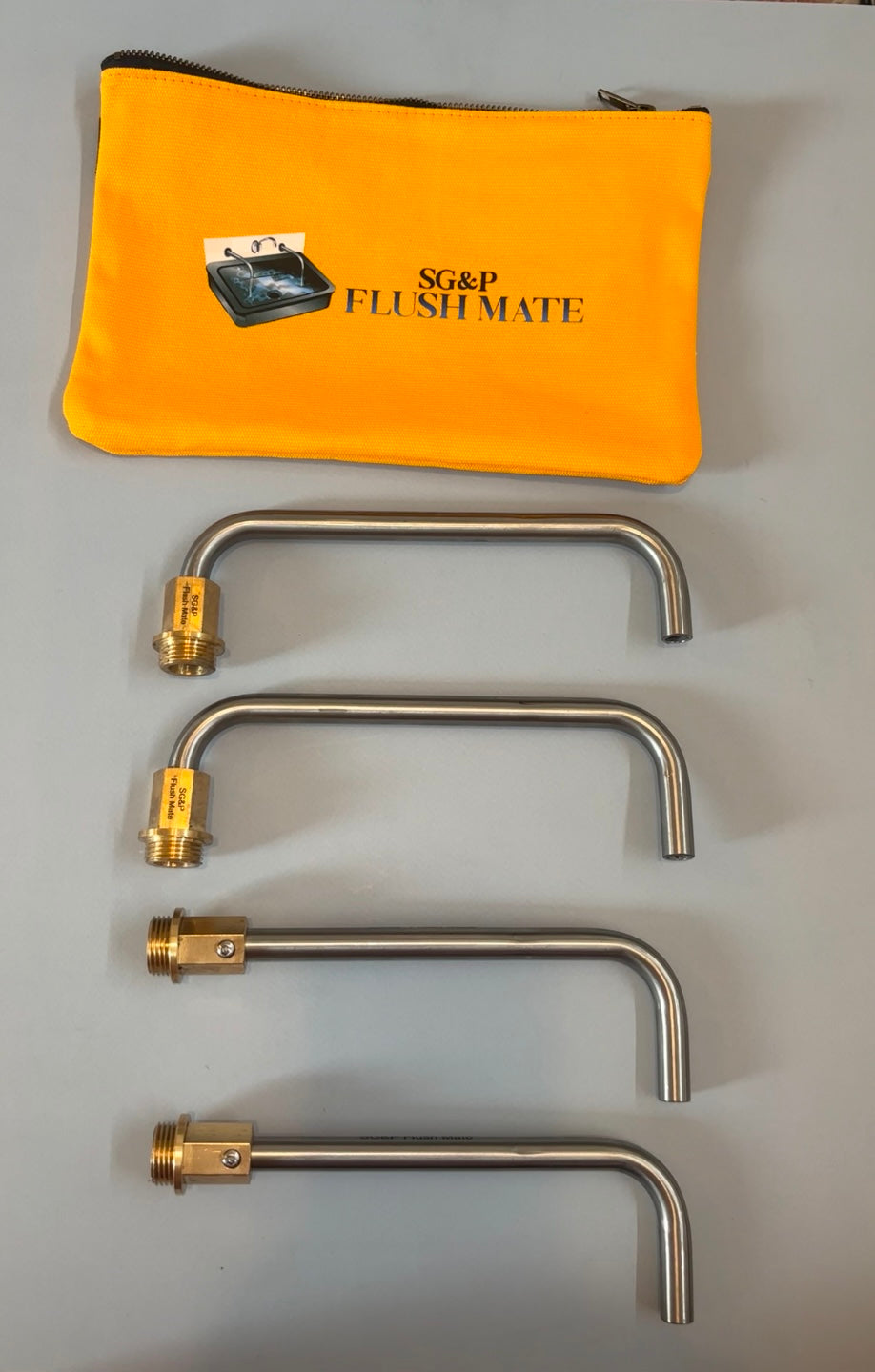 Plumbing tool. SG&P Flush Mate tool. Plumbing Tap Service Tool - with 4 brass adapters